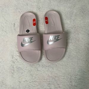 Nike. Brand new. Light pink. Size 6.